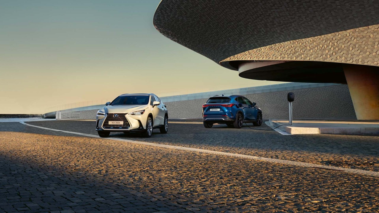 A parked Lexus NX 350h and Lexus 450h+